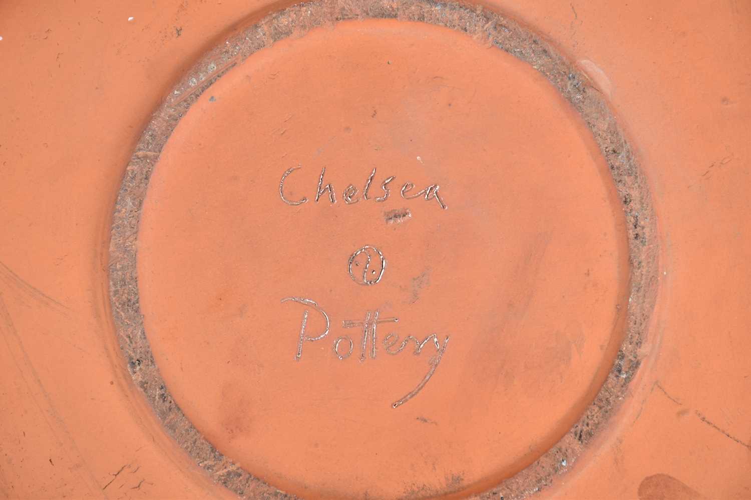 A large Chelsea Pottery terracotta charger, painted with a wading bird by reeds and a stream, - Bild 8 aus 8