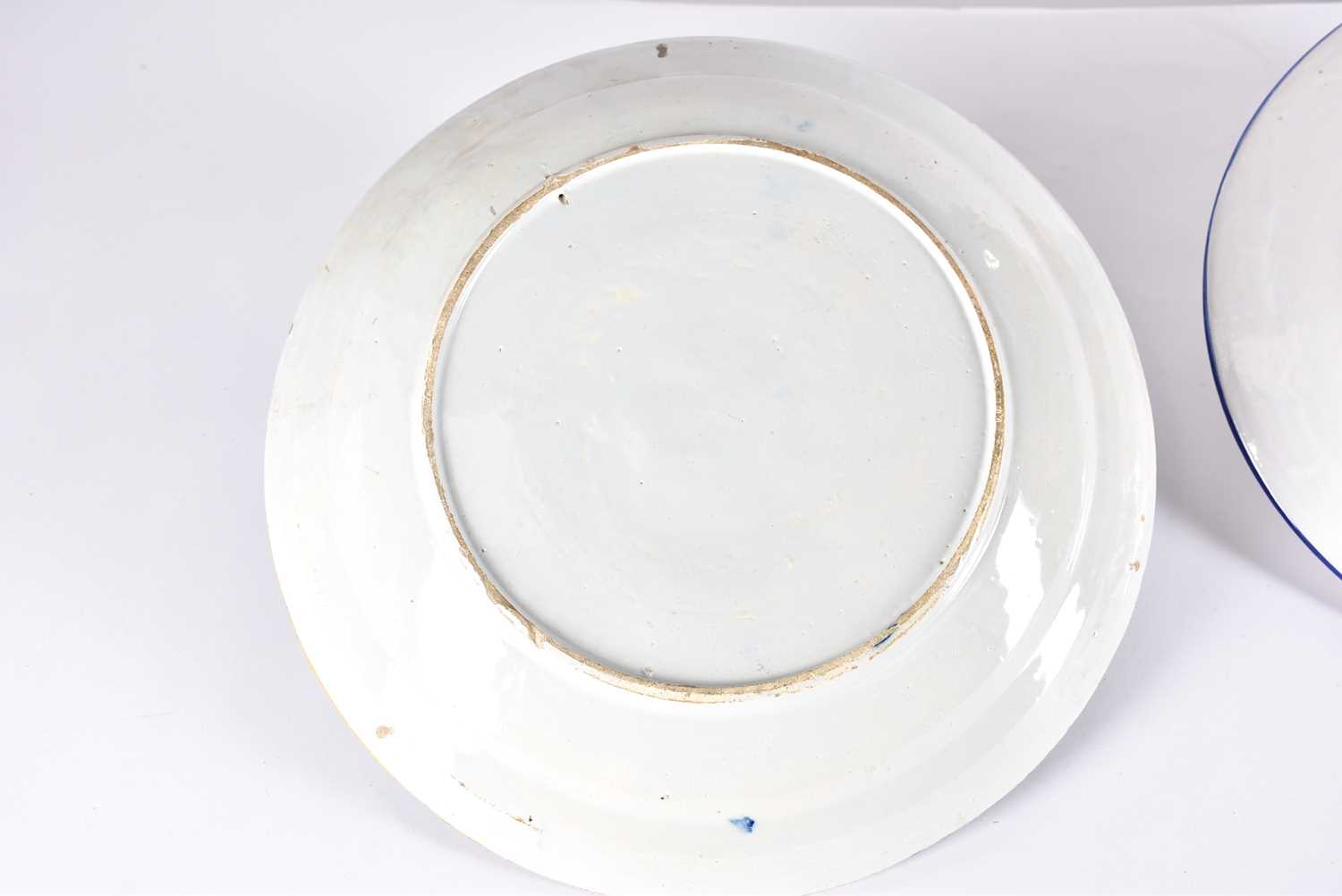 A 19th-century circular French faience blue and white dish with ochre dressed rim 35 cm together - Bild 12 aus 18