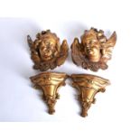 A pair of gilt plaster cherub wall plaques plus a pair of Italian Neoclassical style giltwood
