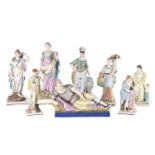 A collection of early 19th century Staffordshire pearlware figures, including an Enoch Wood figure