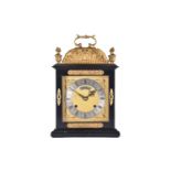 An F W Elliott Golden Jubilee bracket clock, the ebonised case with gilt metal mounts, chiming on