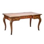 A French Louis XV style rococo marquetry and Kingwood bureau plat of inverted breakfront form,