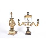 An Empire period three branch candelabra,19th century, the central stem with gilt leaf from arms