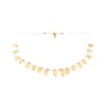 A seed pearl necklace, strung with briolette cut citrine drops, 33cms long