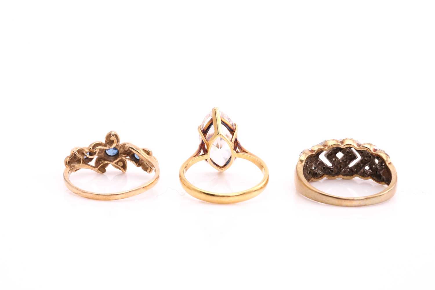 A lot consists of three rings, one comprises a marquise cubic zirconia, claw set on an 18ct yellow - Image 2 of 3