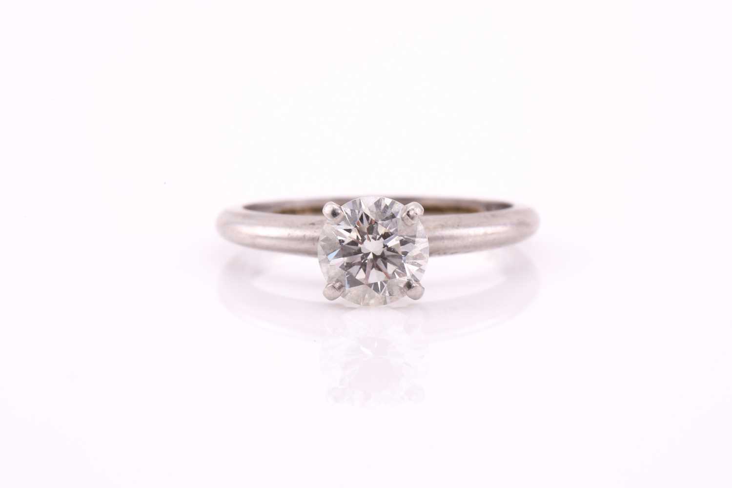 A solitaire diamond ring, the round brilliant cut diamond, approximately 1ct, H, VSI, four claw