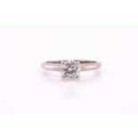 A solitaire diamond ring, the round brilliant cut diamond, approximately 1ct, H, VSI, four claw