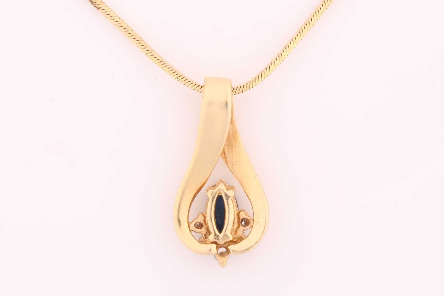 A sapphire and diamond pendant on chain, consisting of a marquise-shaped sapphire with deep body - Image 2 of 3