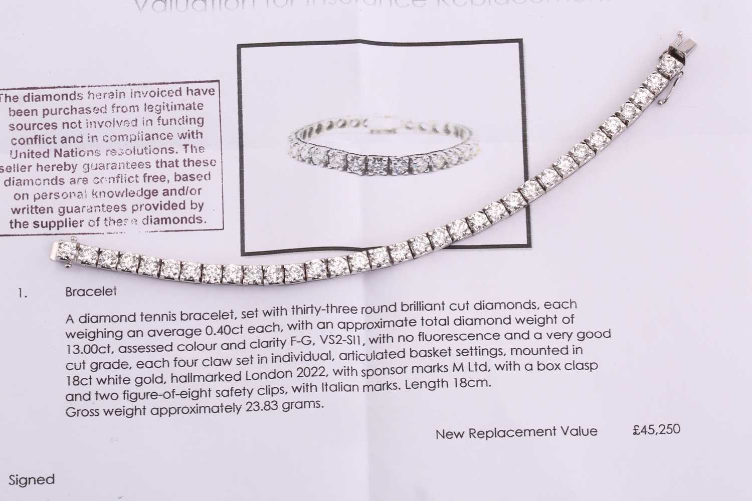 A diamond tennis bracelet, set with thirty-three round brilliant diamonds, each weighing an - Image 8 of 10