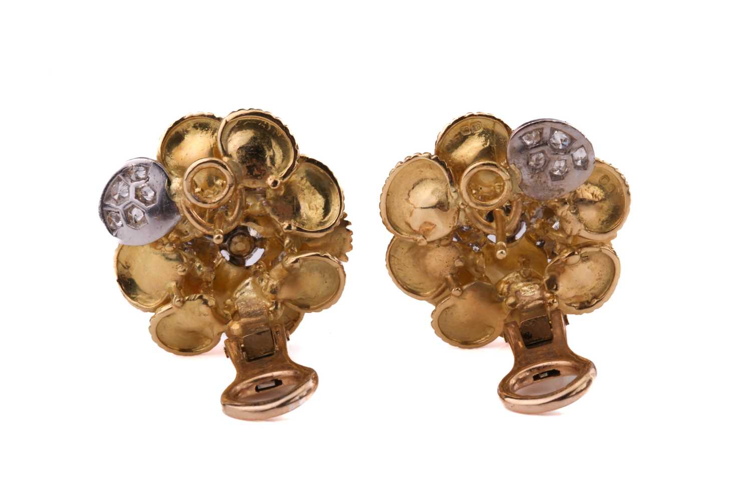 A pair of Kutchinsky platinum and 18ct yellow gold diamond earrings, each comprises a flower head - Image 3 of 6