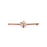 A diamond bar brooch in the form of a three-leaf clover, set with three old round-cut diamonds,