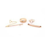 A 9 carat gold Mizpah ring; a single stone opal ring; a single stone diamond bar brooch and an