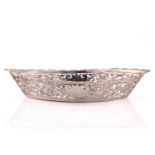 An Edwardian navette form pierced silver breadbasket. Chester 1902 by William Neale. With cast and