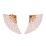 A pair of Erté 'Nile' earrings, each comprises round sapphire cabochon accents on the bi-coloured