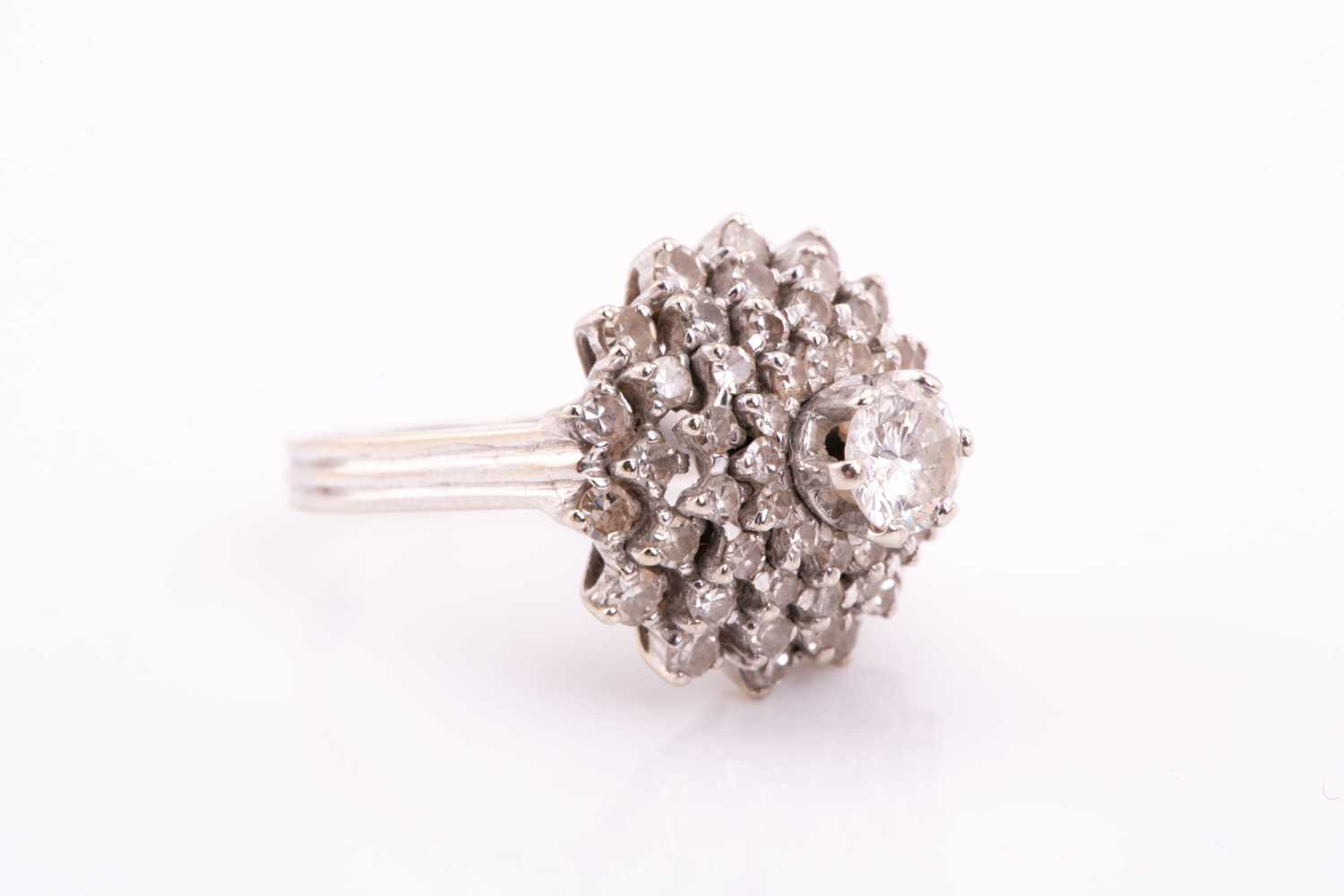 A diamond cluster dress ring; the four tiers of round brilliant cut diamonds in claw mounts and - Image 5 of 6