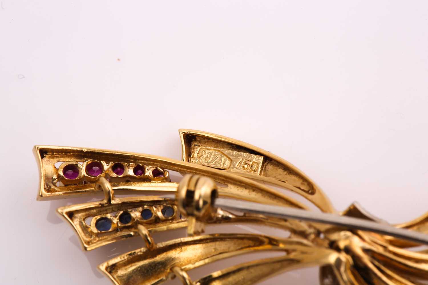 An 18ct bi-coloured gold bow brooch with gemstone accents, consisting of small round sapphires and - Image 5 of 5