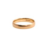 An 18ct yellow gold wedding ring, consisting of a plain D-section band, with convention hallmark 750