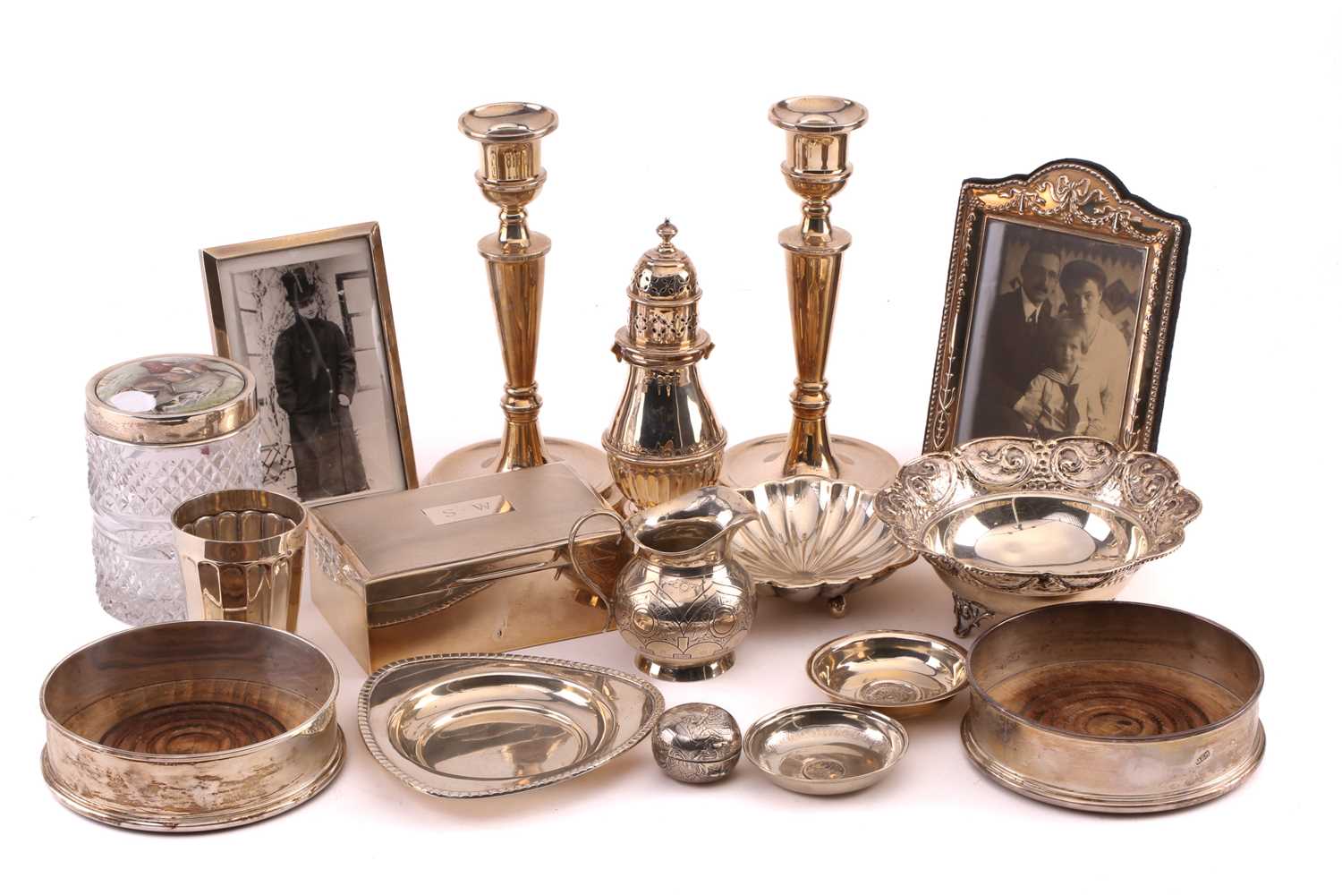 A small collection of silver items including: Pair of candlesticks, weighted bases, Birmingham 1980,