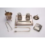 A small collection of hallmarked silver items to include a two bottle inkstand fitted with cut glass
