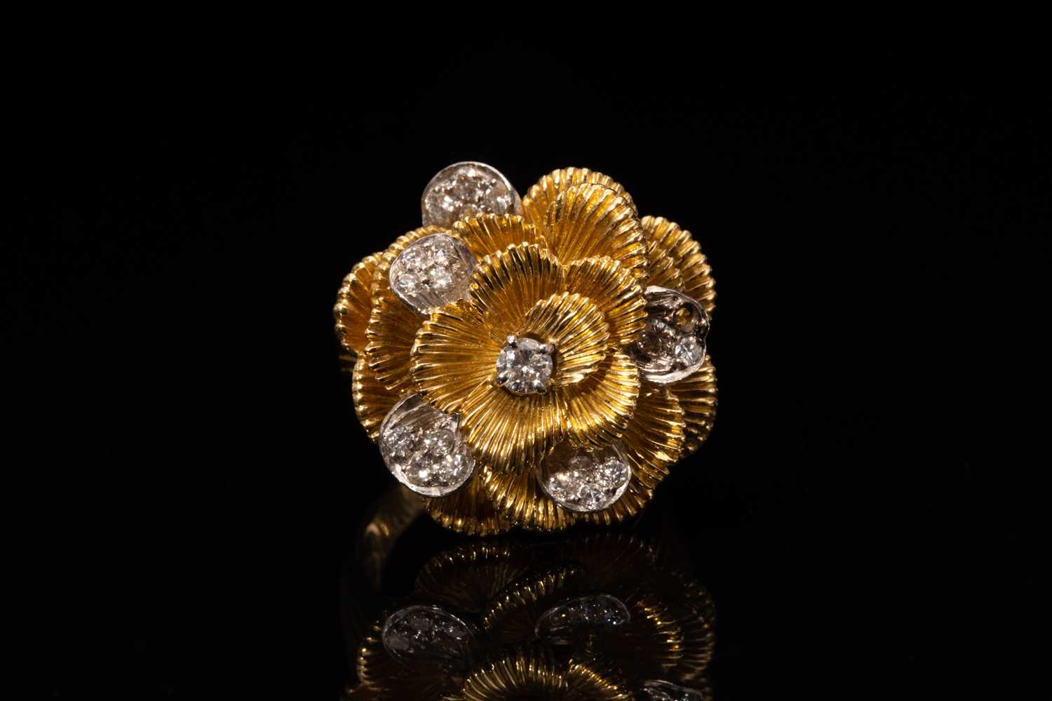 A Kutchinsky platinum and 18ct yellow gold diamond ring, comprises a flower head with layering - Image 9 of 10