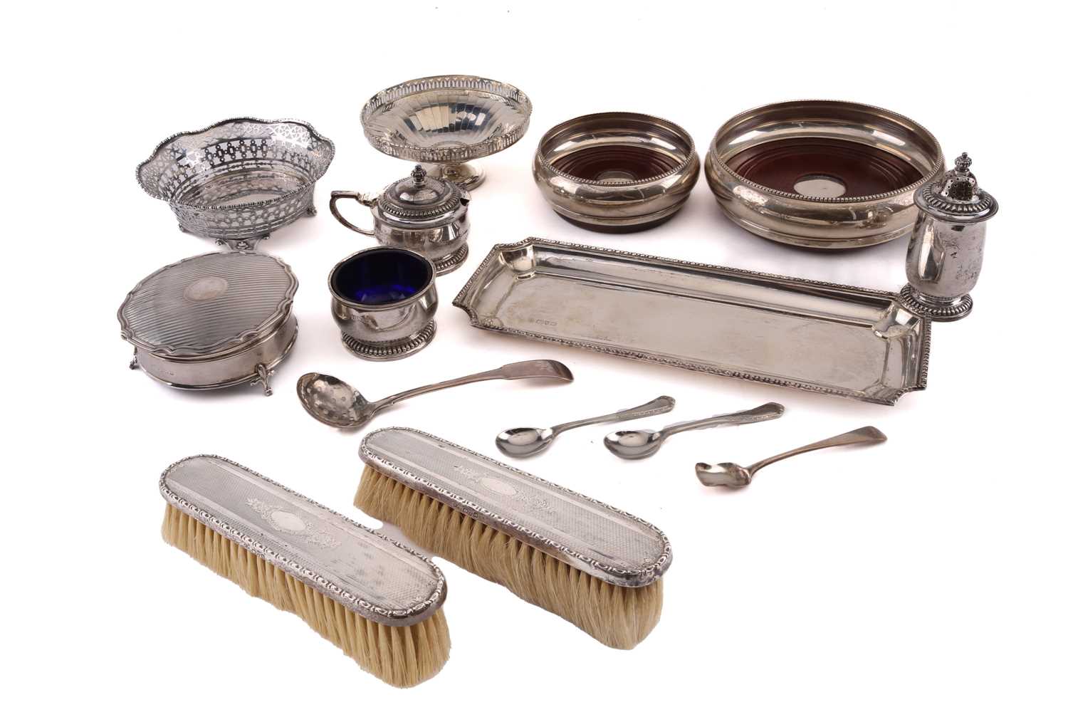 A small collection of silver items to include bonbon dish, wine coasters, suffer tray and other