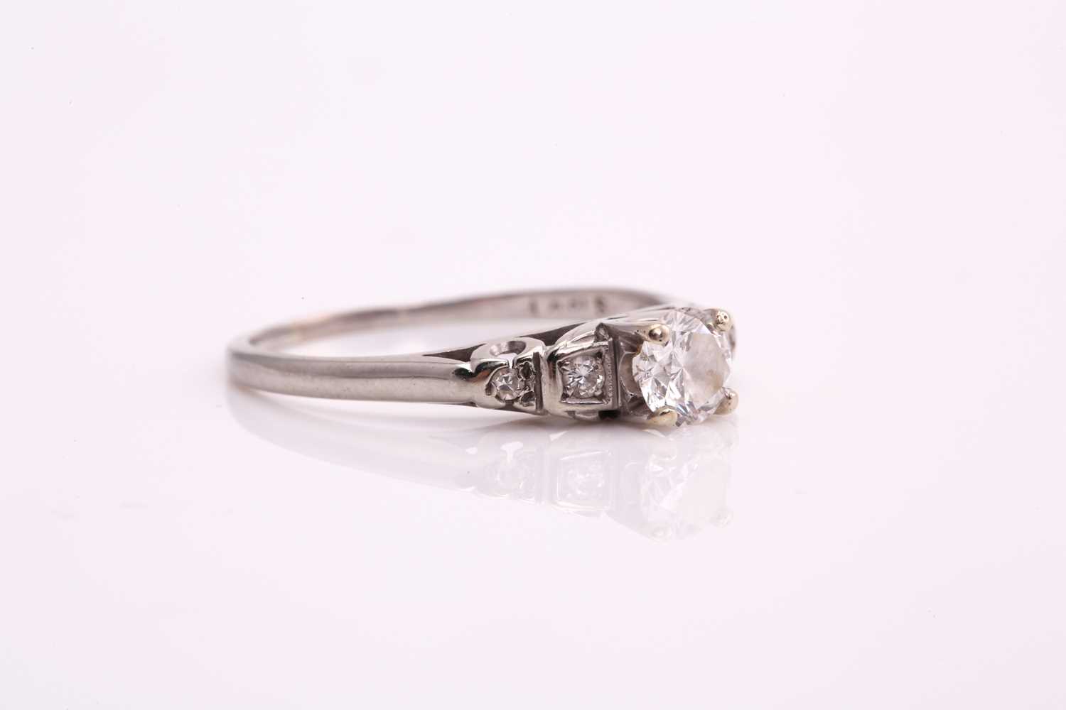 A diamond cathedral engagement ring, consisting of a round brilliant central diamond of 0.37cts, - Image 4 of 7