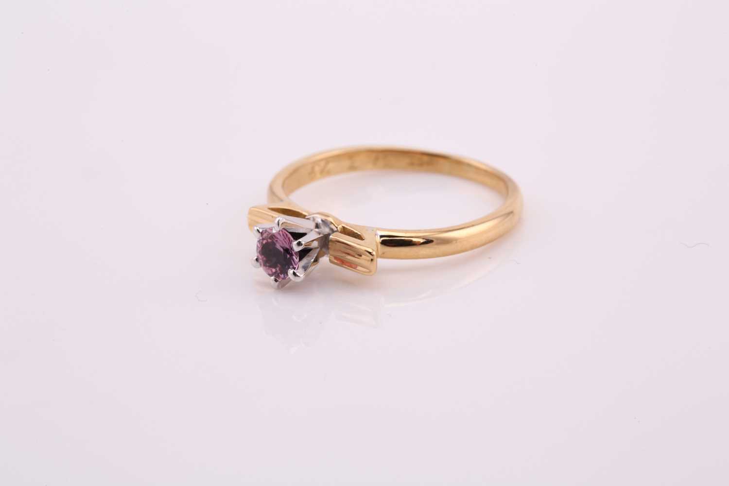 A pink sapphire solitaire ring, comprises a round pale pink sapphire approximately measuring 3.8 mm, - Image 4 of 4