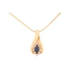 A sapphire and diamond pendant on chain, consisting of a marquise-shaped sapphire with deep body