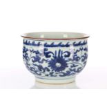A Chinese blue & white deep sided bowl, in the Ming style, with lotus flower decoration beneath a