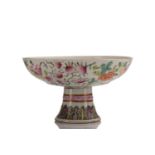 A finely potted Chinese famille rose pedestal bowl, early 20th century, the interior painted with