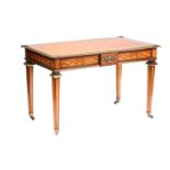 In the manner of Jean-Henri Riesener a Louis XVI style satinwood and mahogany bureau plat, English