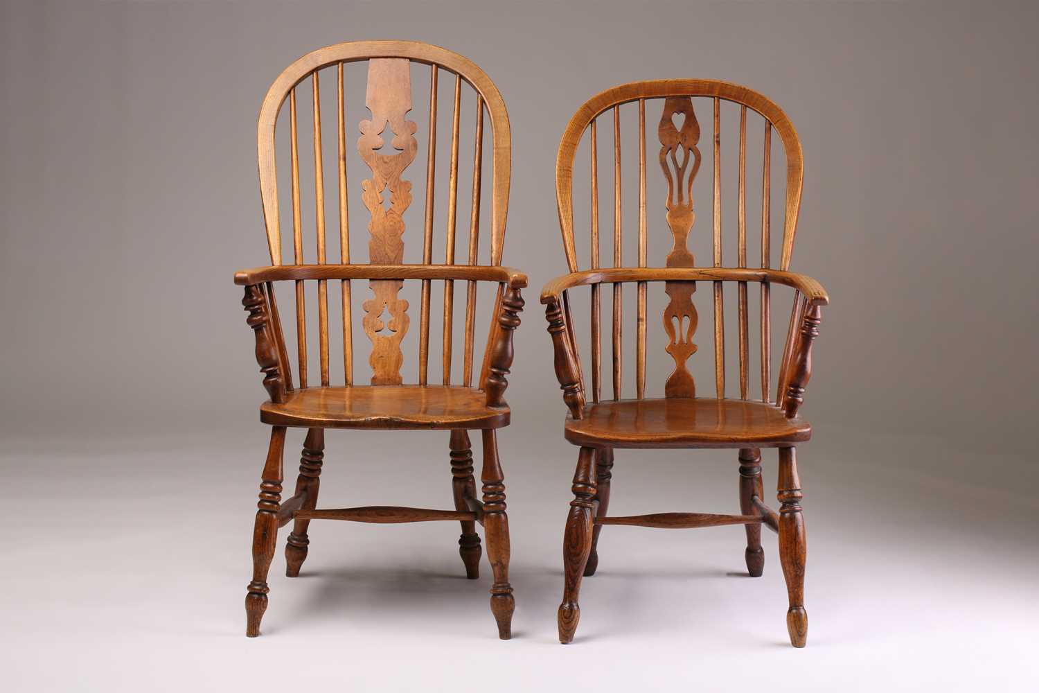 A 19th century Windsor high hoop back elm and ash armchair and one other similar, both with saddle - Image 4 of 5