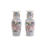 A large pair of Chinese Famille Rose porcelain baluster vases, Qing dynasty, late 19th century.