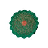 An Islamic embroidered panel, the flower form wire thread embroidery worked with calligraphy in each