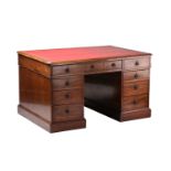 A George IV/ William IV mahogany partners kneehole writing desk with tooled leather and