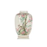 A Chinese famille rose vase, finely painted with a locust on a rock before a blossoming tree