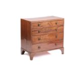 A George III satinwood strung mahogany caddy topped commode fitted four long drawers, supported on