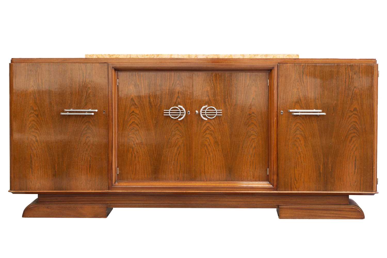 A Continental Art Deco walnut sideboard with raised marble top with central recessed cupboards