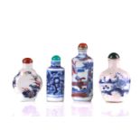 Two Chinese blue & white snuff bottles heightened with iron red, late 19th & 20th century, the