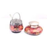 A Moorcroft Pomegranate pattern inkwell, of squat form with plated mounts, 11.3 cm diameter at the