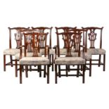 A set of eight George III mahogany dining chairs, possibly Scottish. The set comprises two open