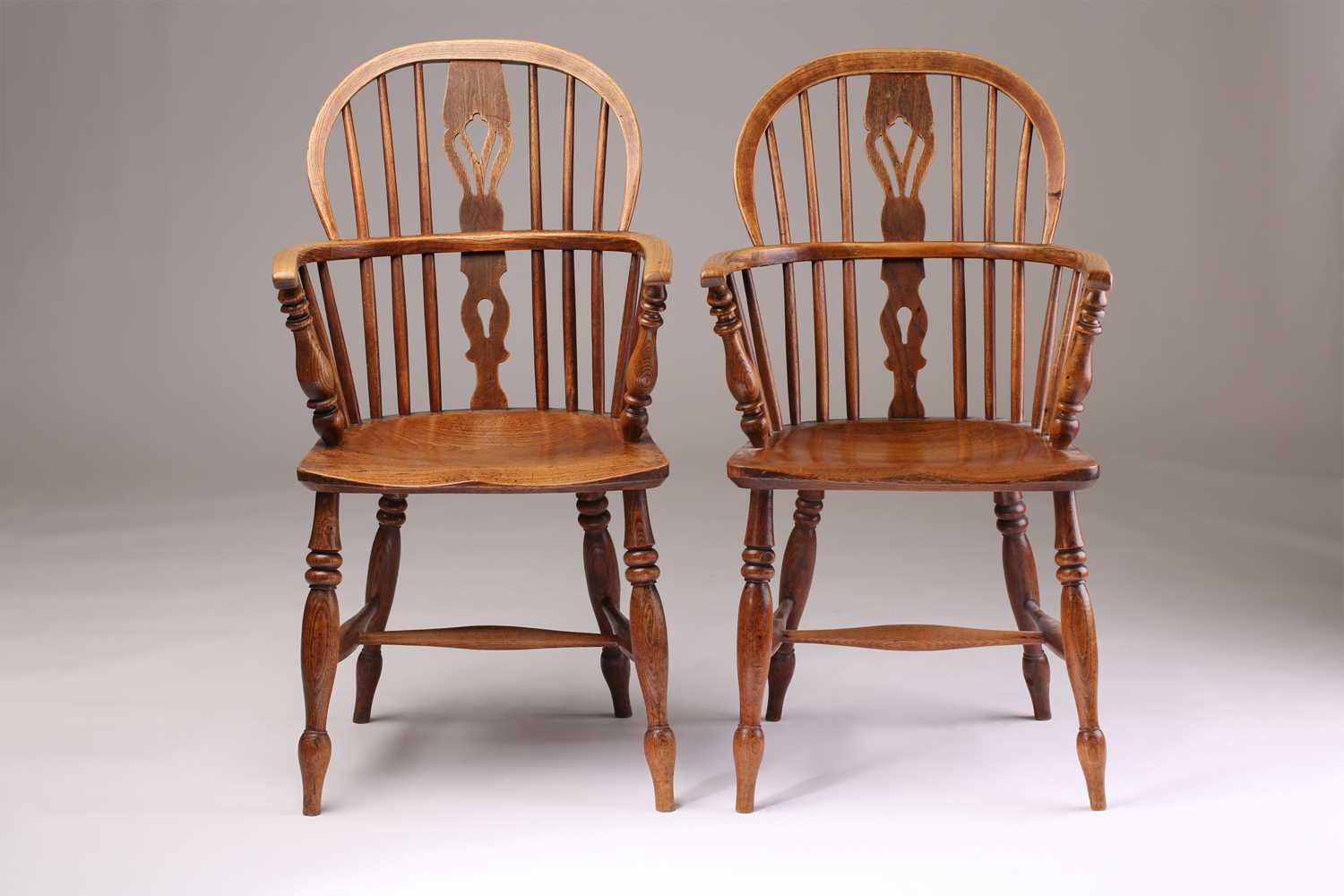 A close pair of 19th-century elm and ash hoop backed Windsor open armchairs with pierced " - Image 2 of 5