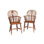 A close pair of 19th-century elm and ash hoop backed Windsor open armchairs with pierced "