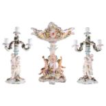 A pair of late 19th-century continental porcelain Sitzendorf figural four sconce table candelabra