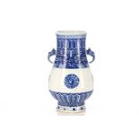 A Chinese porcelain blue & white Hu form vase, with bixie mask and tongue handles, painted with
