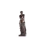 After Alexandros of Antioch a patinated grand tour figure of "The Venus de Milo" 20th century. On