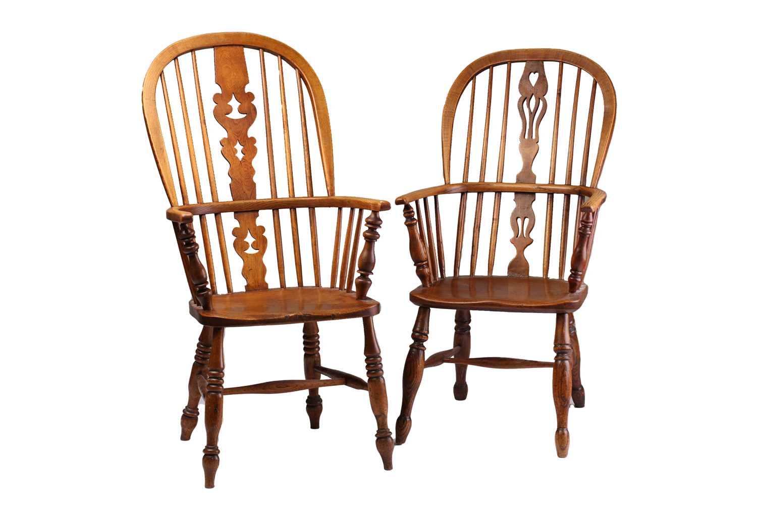A 19th century Windsor high hoop back elm and ash armchair and one other similar, both with saddle