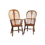 A 19th century Windsor high hoop back elm and ash armchair and one other similar, both with saddle