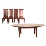 Smallbone of Devizes a contemporary oval Zebrano and mahogany dining table together with a set of