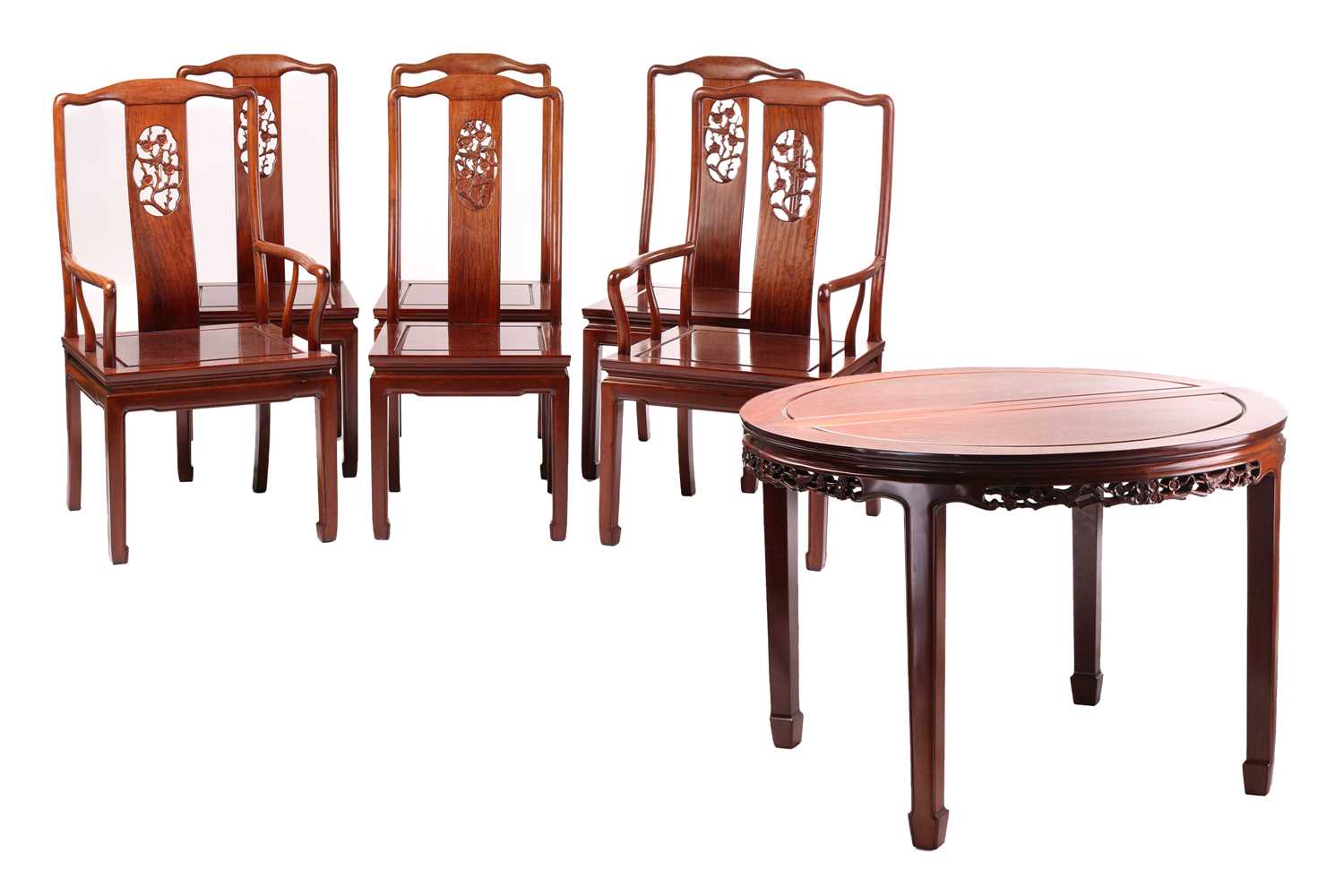 A 20th-century Chinese padouk wood extending circular dining table with single leaf insert and six
